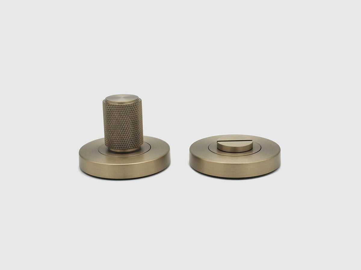 Zephra privacy turnsnib lock set in Brushed Gold