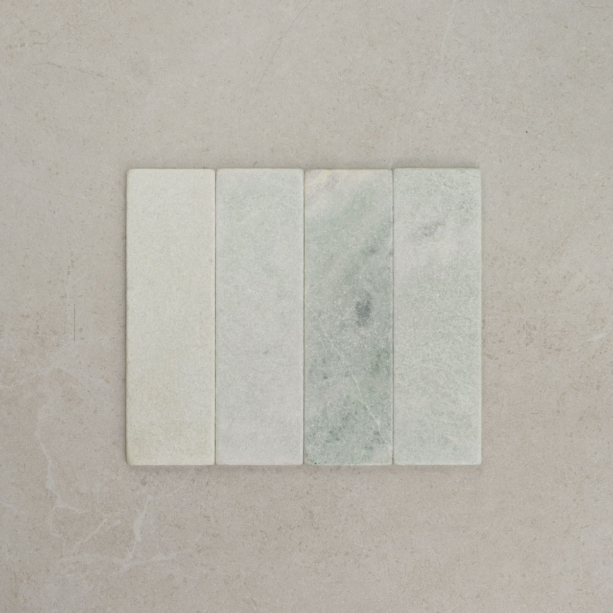 Apollo Natural Stone Subway Tile 60x200mm in Terra, Navona, Carrara, Ice, Charcoal, Mint ( Sage Green ) & Pepper, Tumbled finish