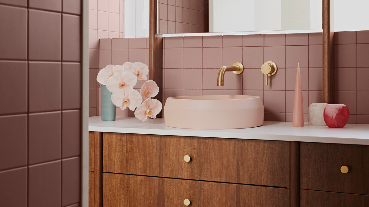 Nood Co Prism Circle Concrete Basin in Blush Pink, installed in a finished bathroom