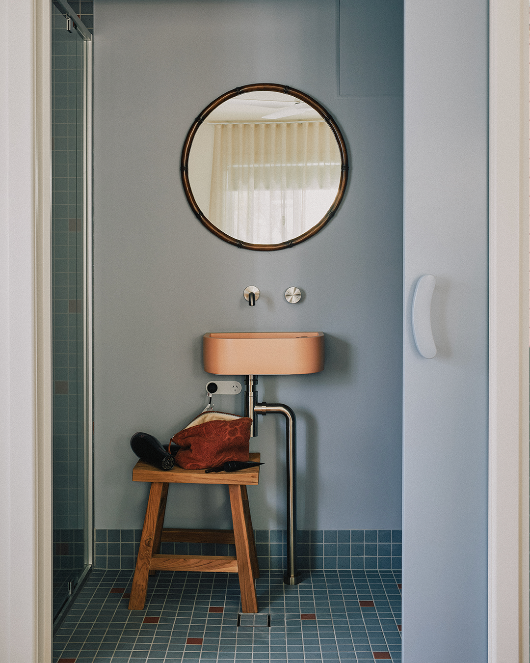 Nood Co Loop 01 Concrete Basin in Pastel Peach, installed in a finished bathroom