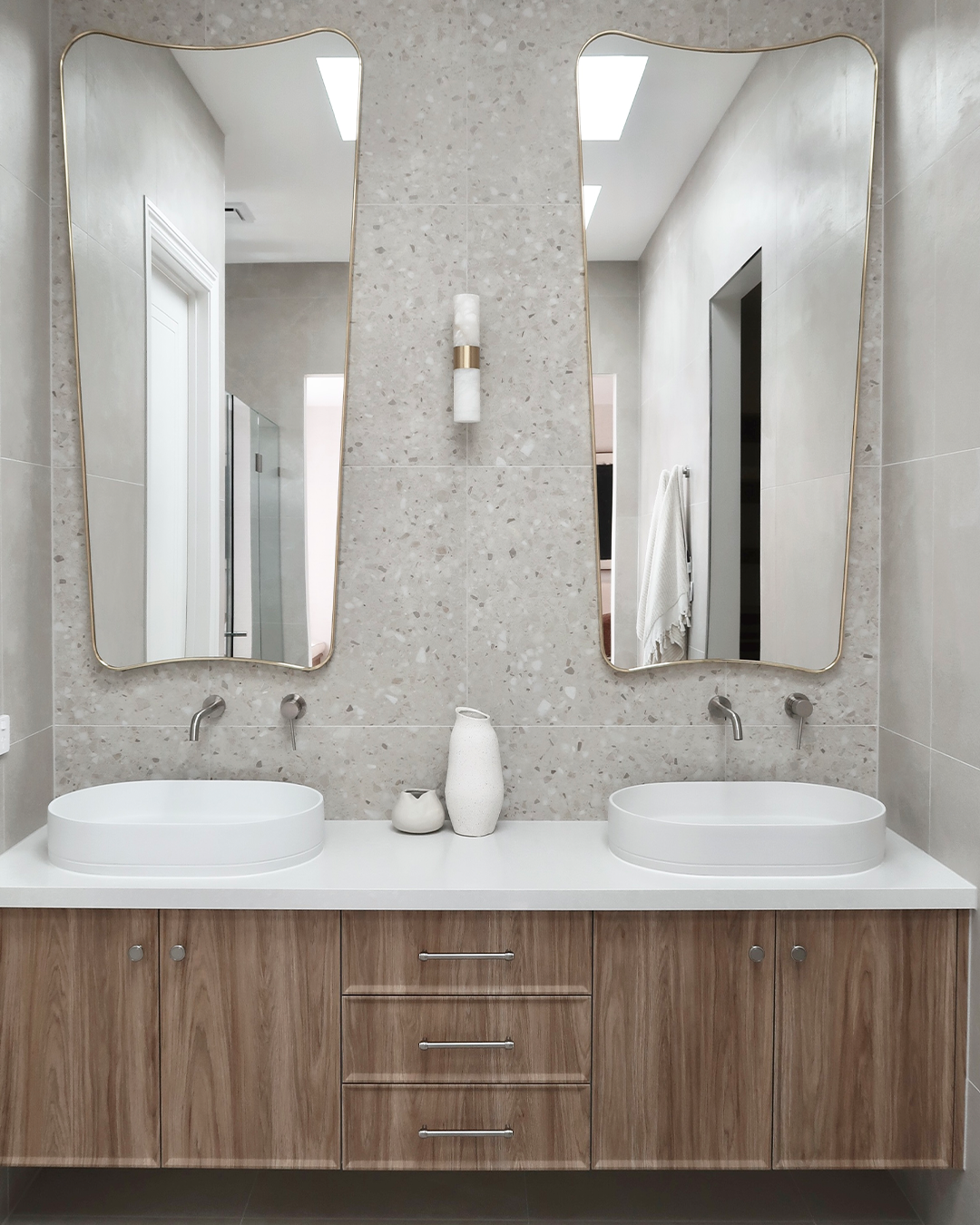 Nood Co Pill Concrete Basin in Ivory, installed in a finished bathroom