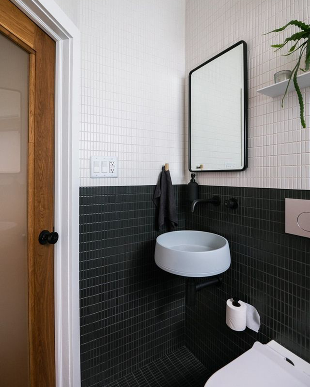 Nood Co Funl Concrete Basin in Powder Blue, installed in a finished bathroom