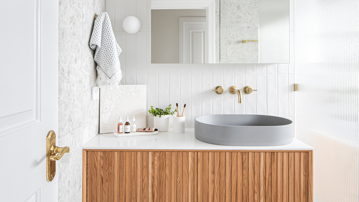 Nood Co Pill Concrete Basin in Sky Grey, installed in a finished bathroom
