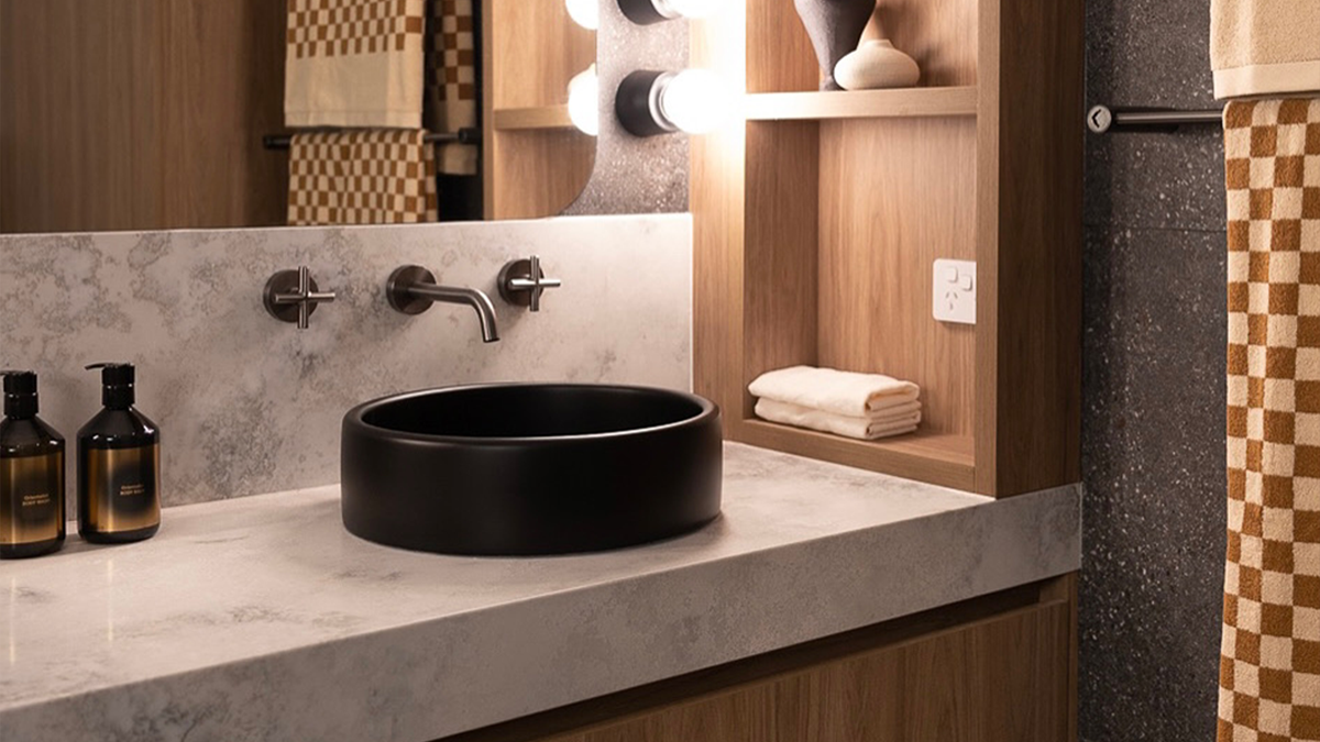Nood Co Bowl Concrete Basin in Charcoal, installed in a finished bathroom