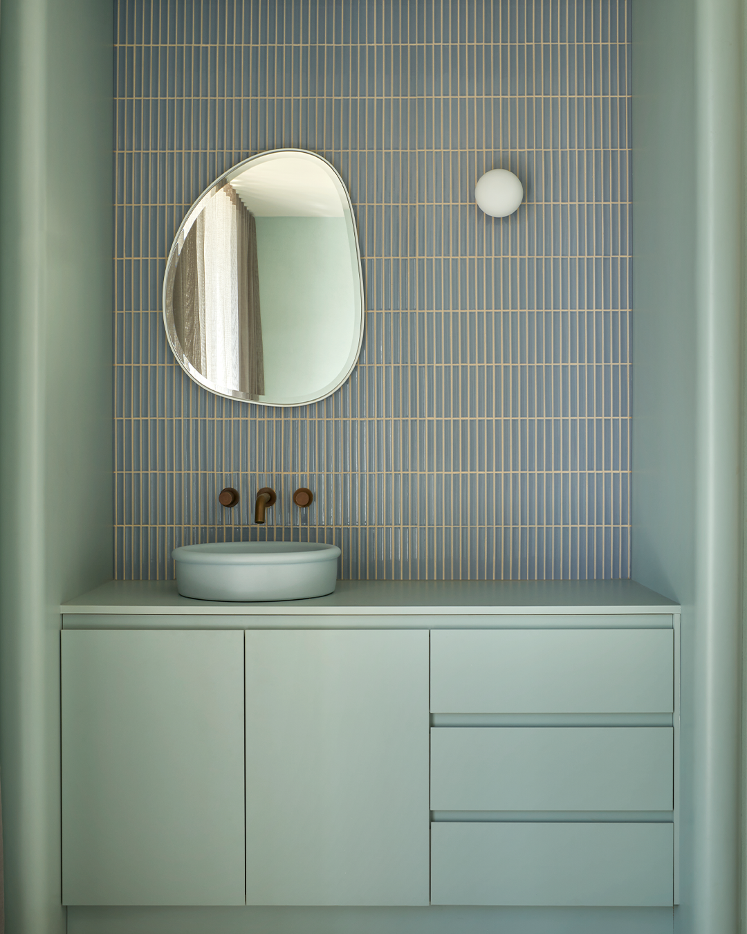 Nood Co Tubb Concrete Basin in Powder Blue, installed in a finished bathroom