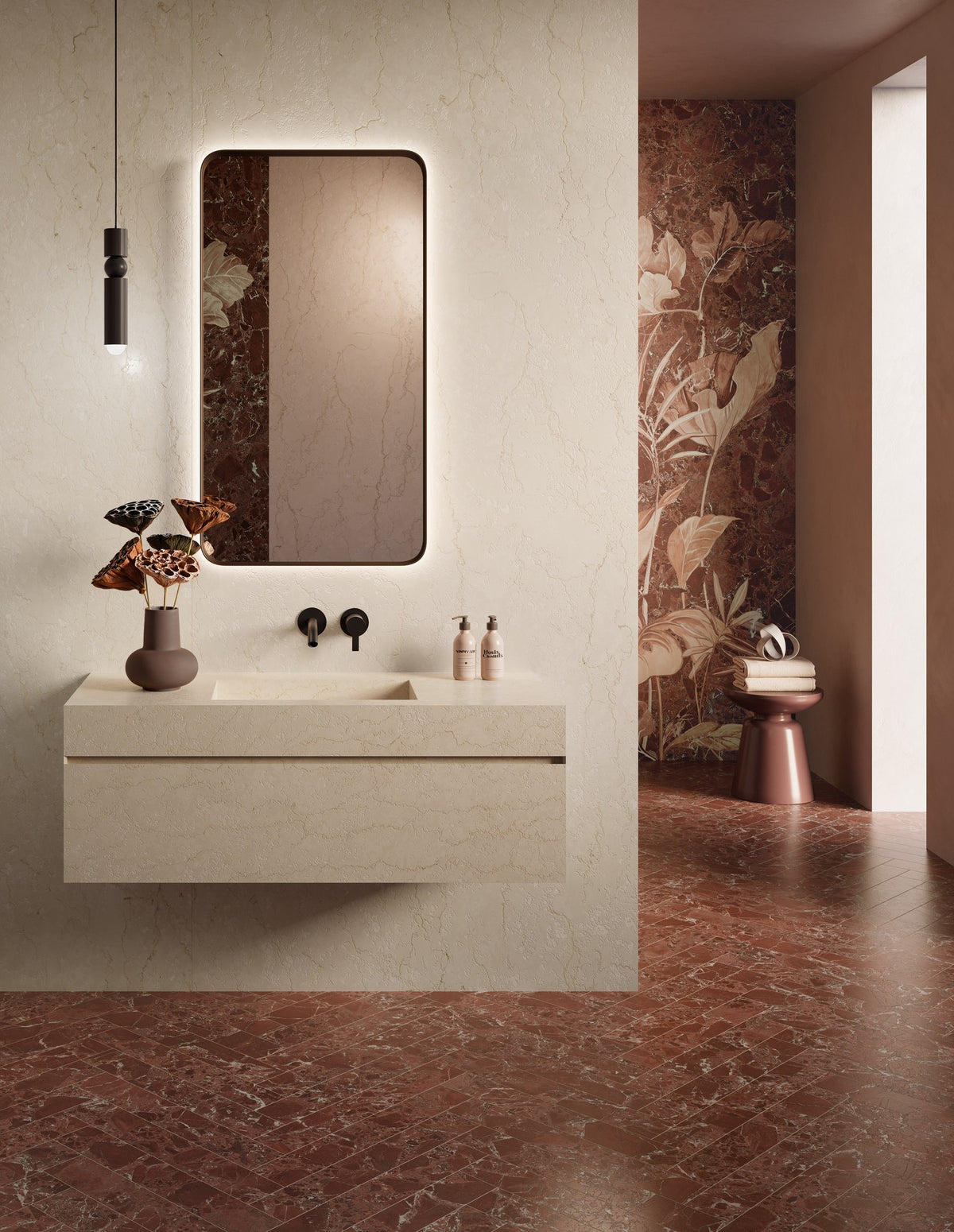 Patina Belfiore Cream porcelain walls and vanity with a Garnet Red herringbone floor, bathroom setting