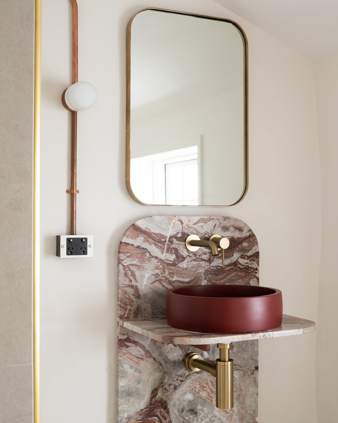 Nood Co Hoop Concrete Basin in Clay, installed in a finished bathroom