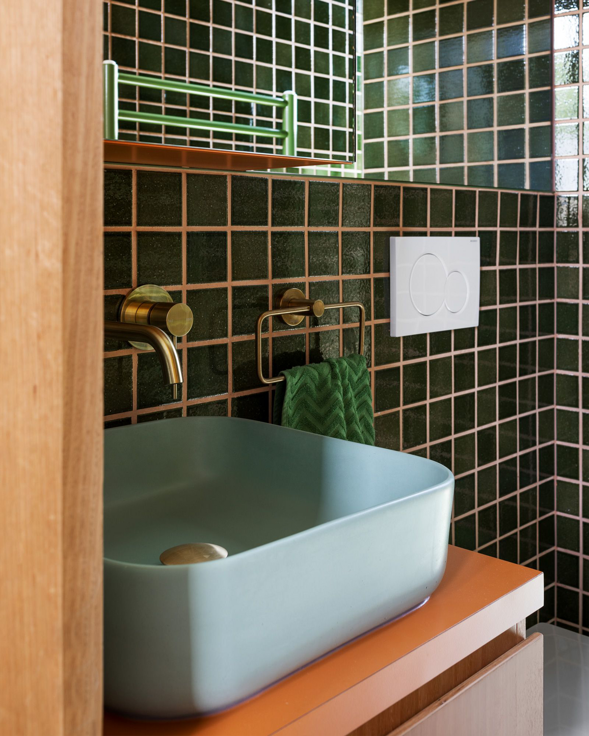 Nood Co Cube Concrete Basin in Powder Blue, installed in a finished bathroom