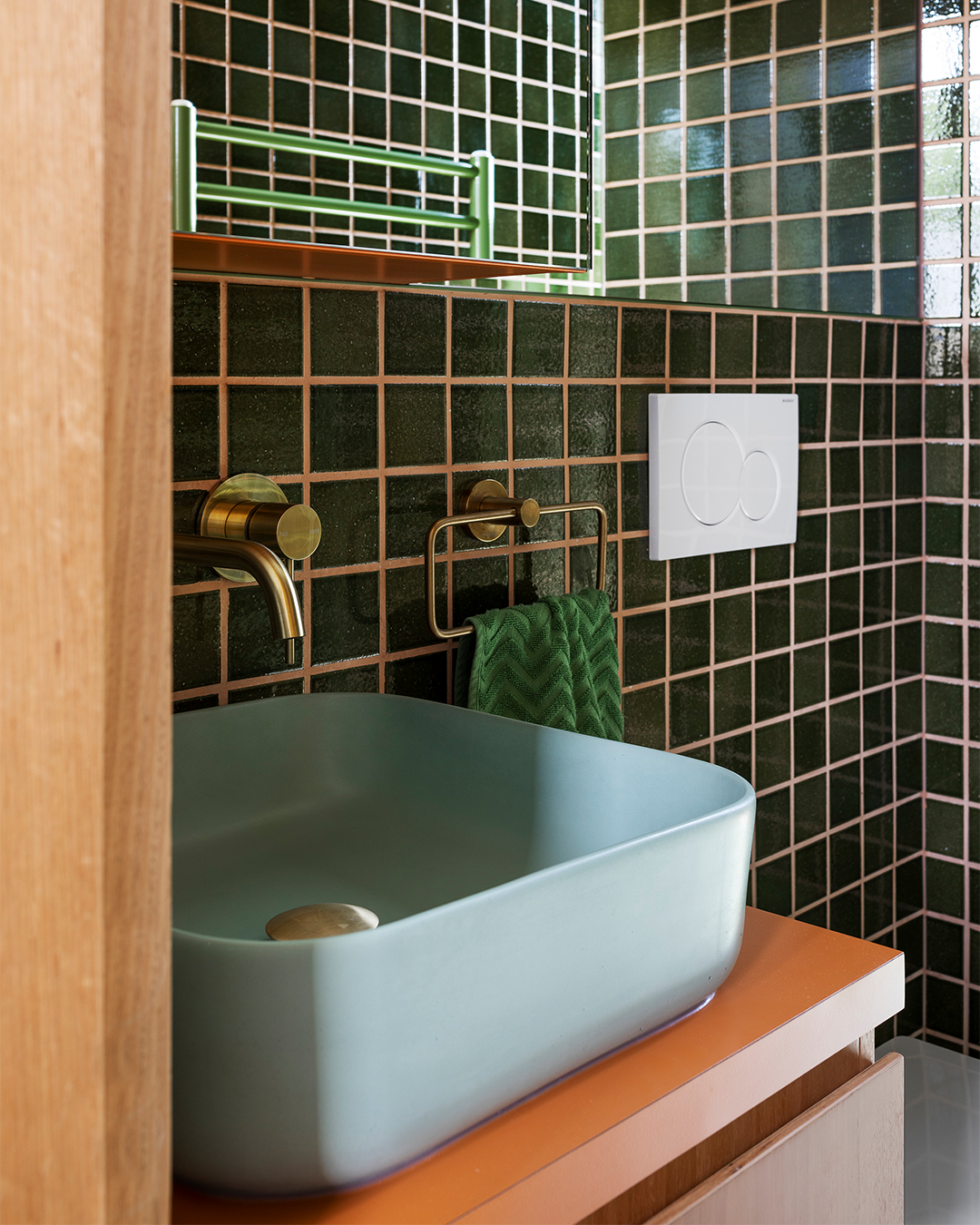 Nood Co Cube Concrete Basin in Powder Blue, installed in a finished bathroom