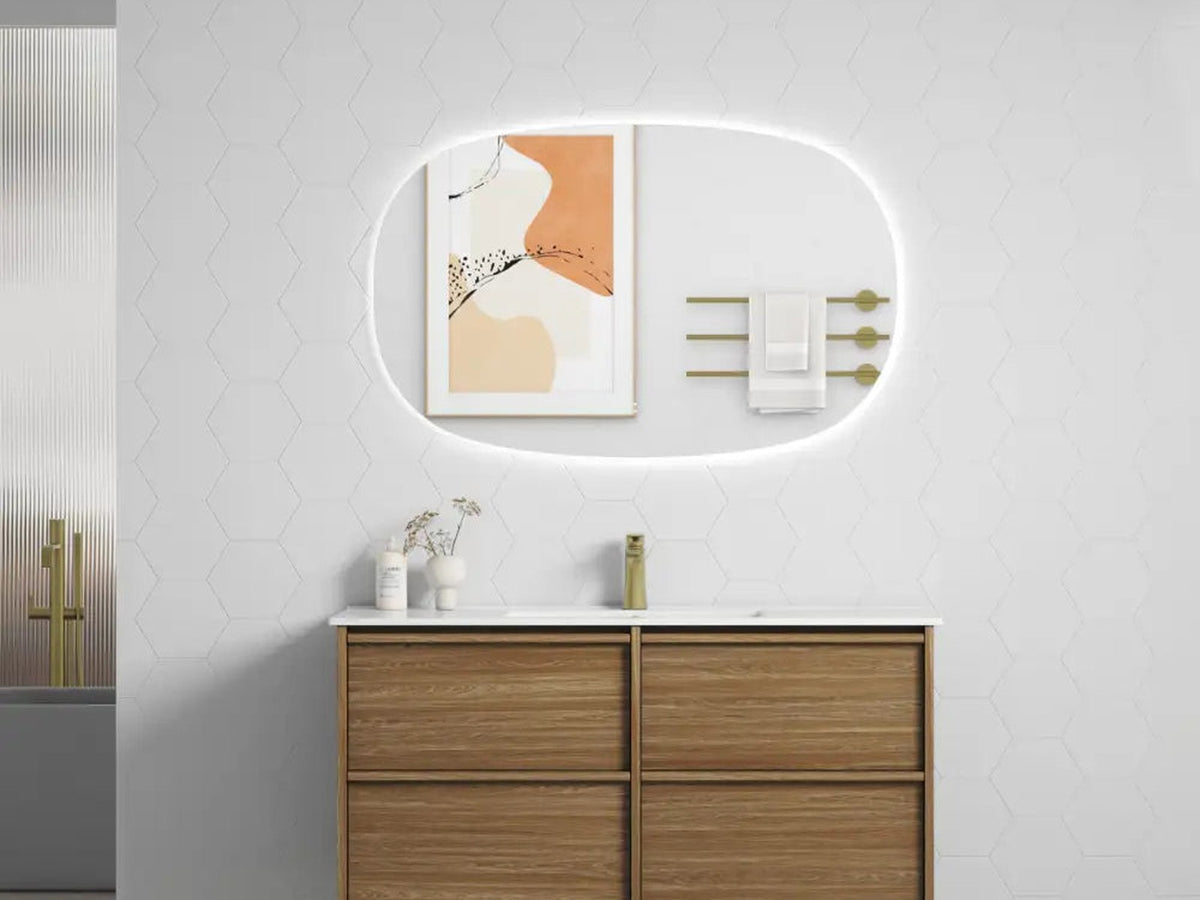 Timber 1200mm wall hung vanity with twin basins and an oval backlit mirror