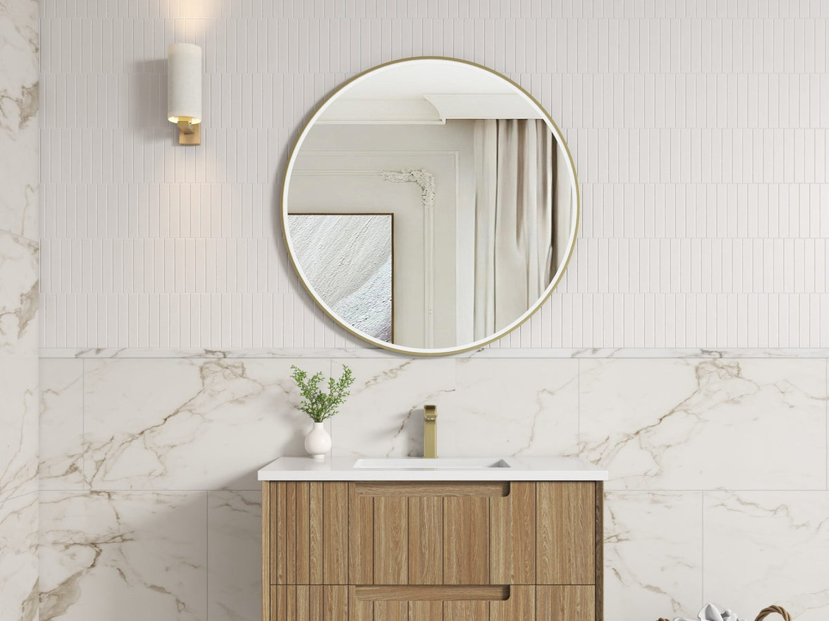 Aulic fluted timber vanity with a round mirror against marble tiles