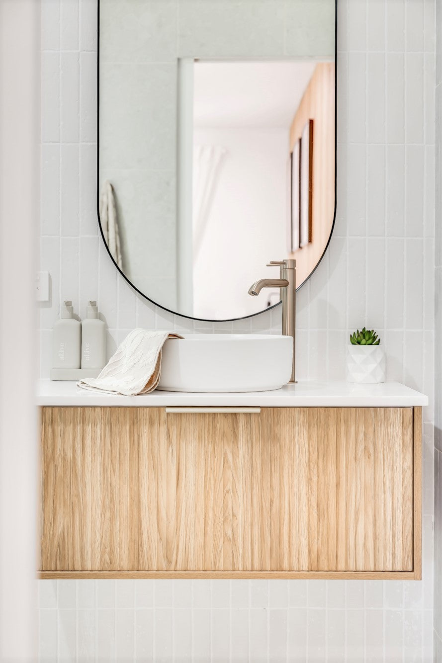 Round Tall Basin Mixer Curved in Champagne | Meir