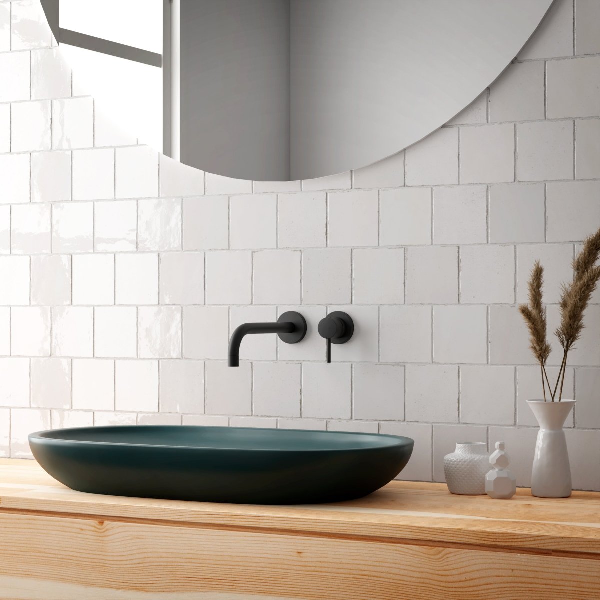 White gloss handmade-look square wall tiles behind a timber vanity with a dark stone basin