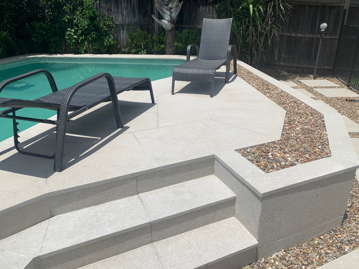 Seagrass Flamed & Tumbled Marble Tile, pool setting