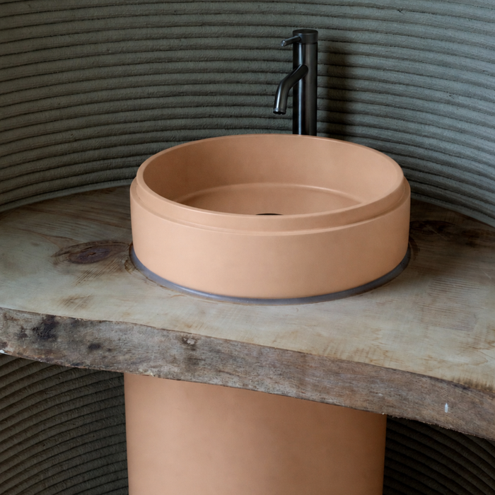 Nood Co Cylinder Stepp Circle Concrete Basin, installed in a finished bathroom