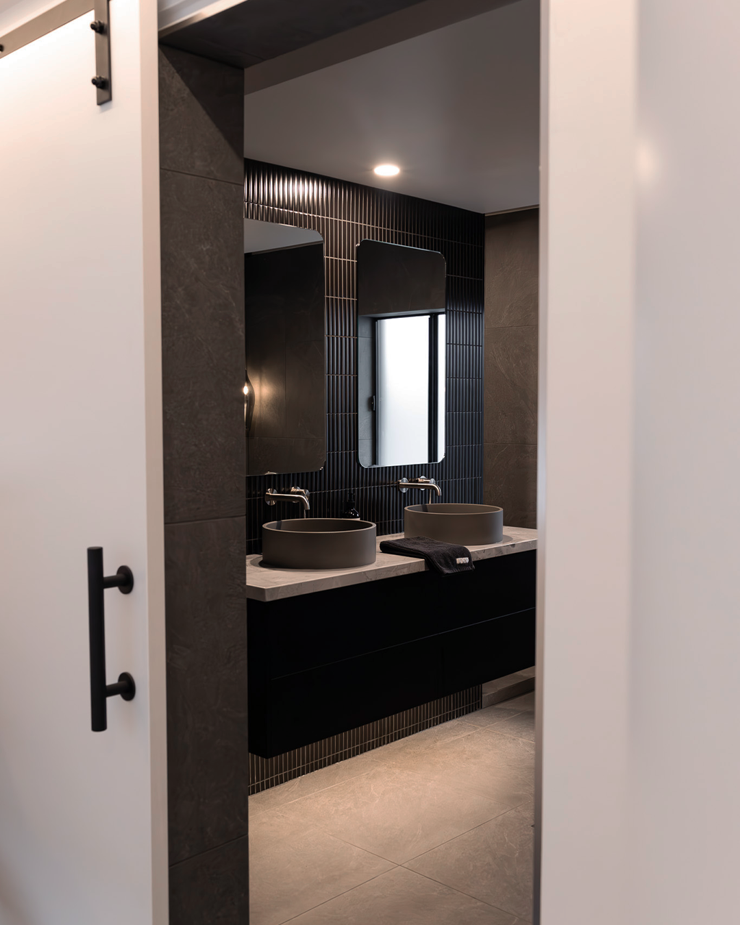 Nood Co Hoop Concrete Basin in Mid Tone Grey, installed in a finished bathroom