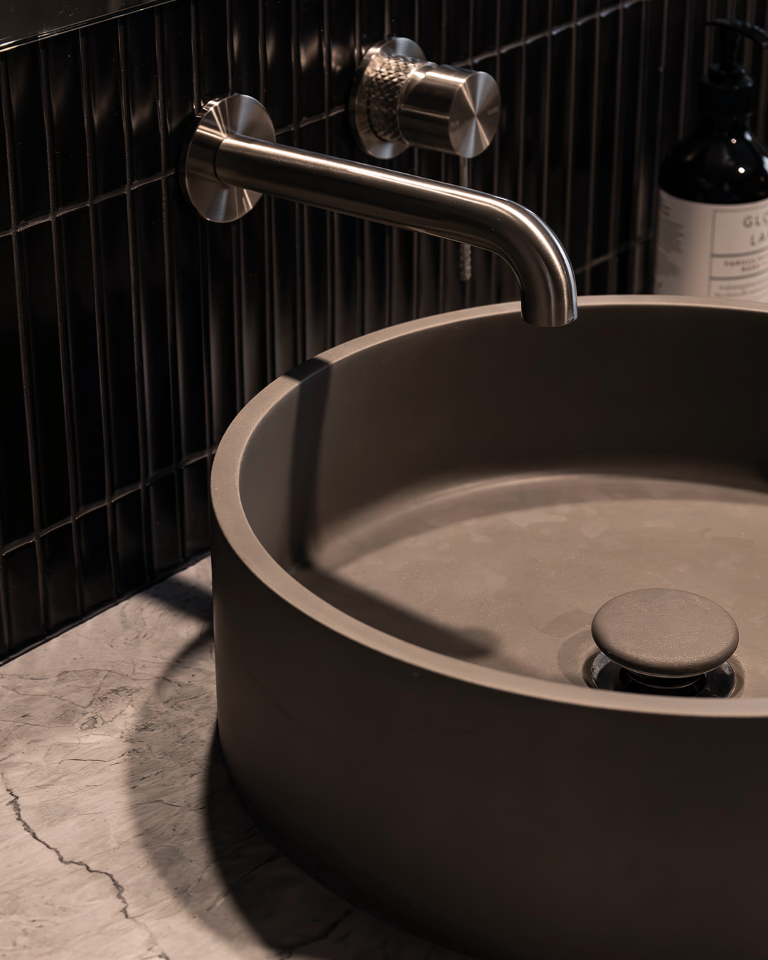 Nood Co Hoop Concrete Basin in Mid Tone Grey, installed in a finished bathroom