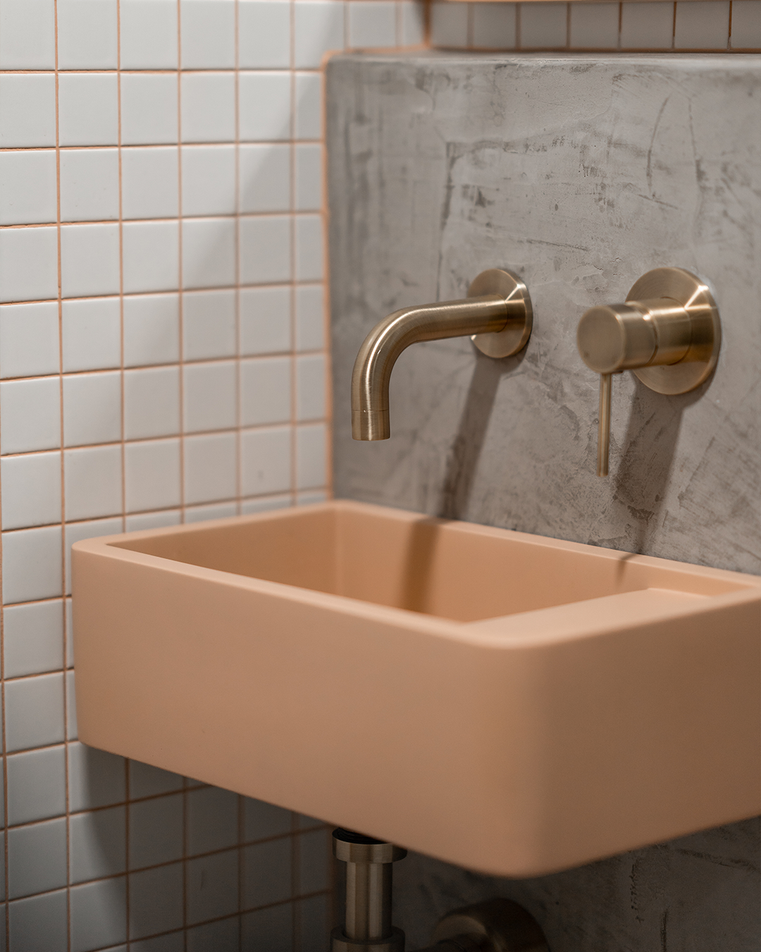Nood Co Shelf 01 Concrete Basin in Pastel Peach, installed in a finished bathroom
