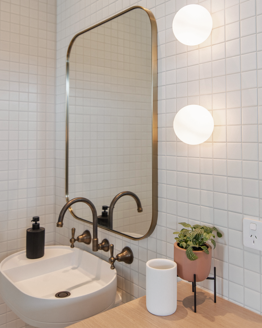 Nood Co Shelf Oval Concrete Basin in Ivory, installed in a finished bathroom
