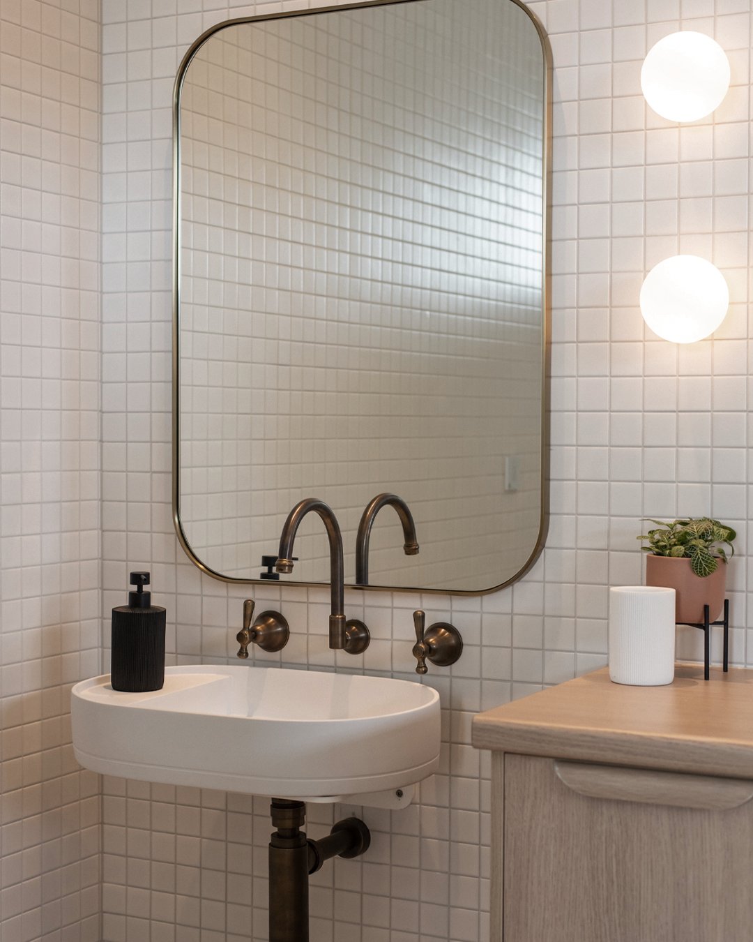 Nood Co Shelf Oval Concrete Basin in Ivory, installed in a finished bathroom