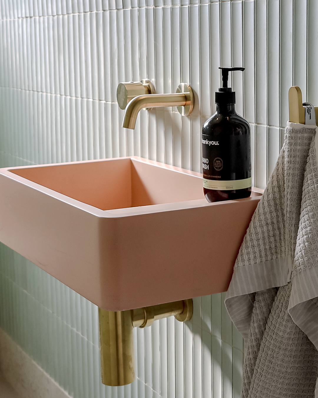 Nood Co Shelf 01 Concrete Basin in Blush Pink, installed in a finished bathroom