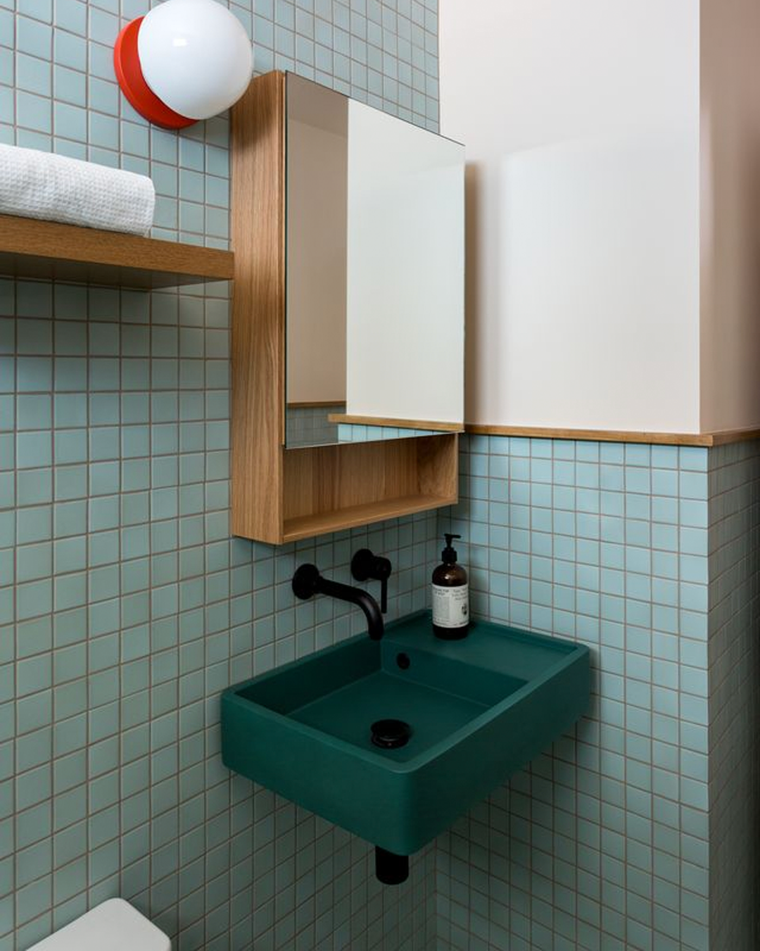 Nood Co Shelf 03 Concrete Basin in Teal, installed in a finished bathroom