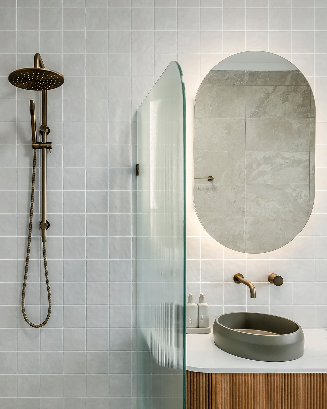 Nood Co Prism Circle Concrete Basin in Olive, installed in a finished bathroom (3)