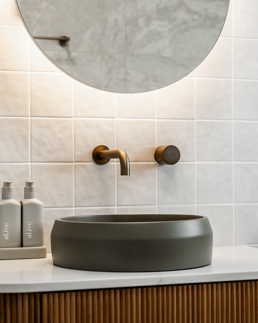Nood Co Prism Circle Concrete Basin in Olive, installed in a finished bathroom (4)