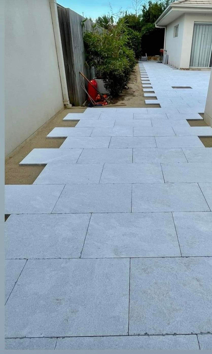 Pearl Grey Tumbled and Sandblasted Marble Tile, outdoor setting