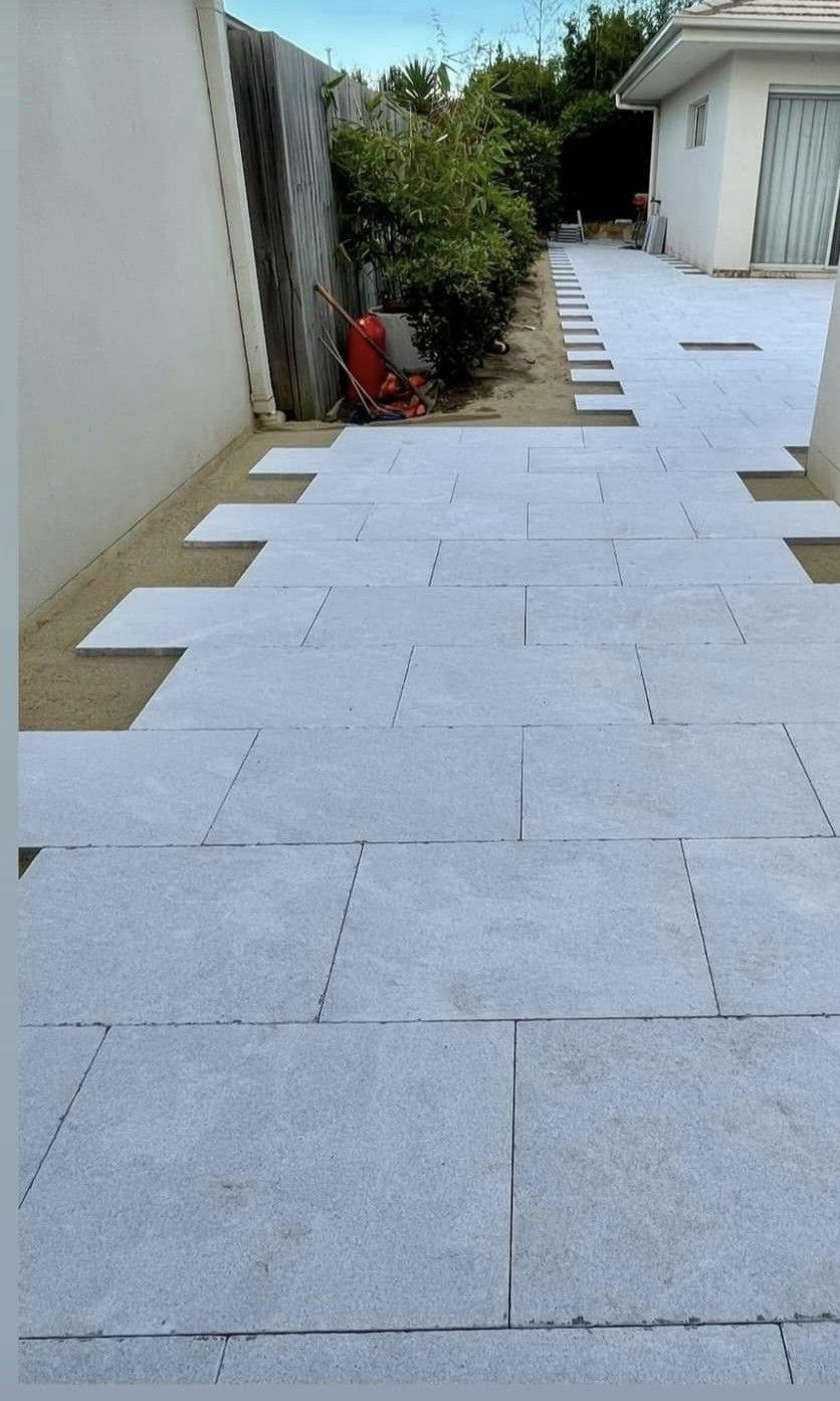 Pearl Grey Tumbled and Sandblasted Marble Tile, outdoor setting