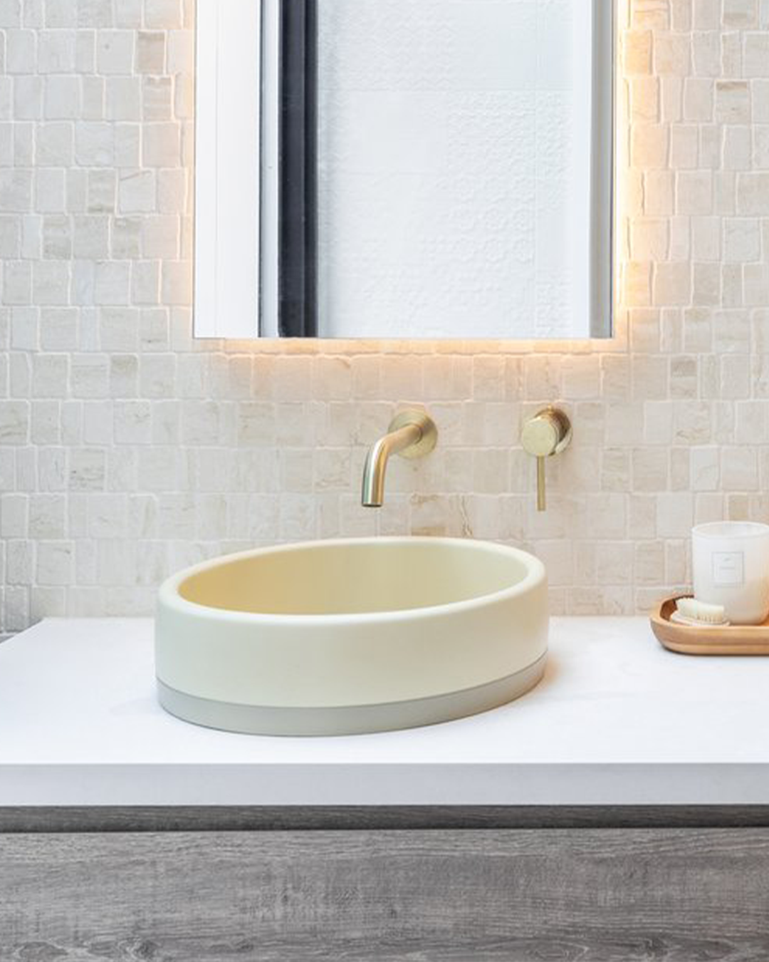 Nood Co Cylinder Bowl Two Tone Concrete Basin in Custard, installed in a finished bathroom (2)