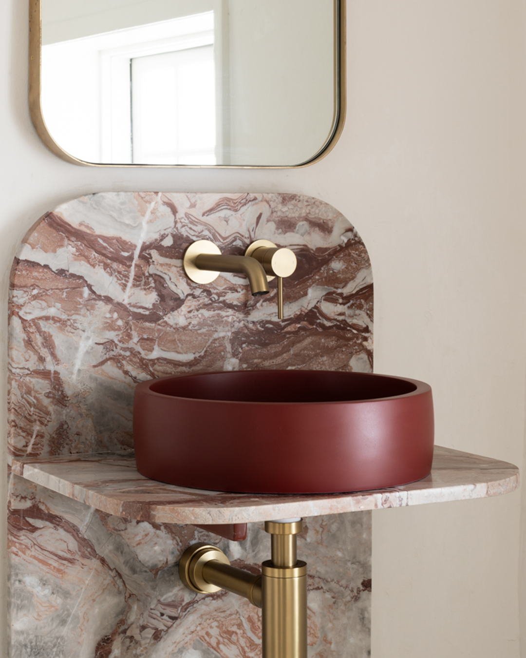 Nood Co Hoop Concrete Basin in Clay, installed in a finished bathroom