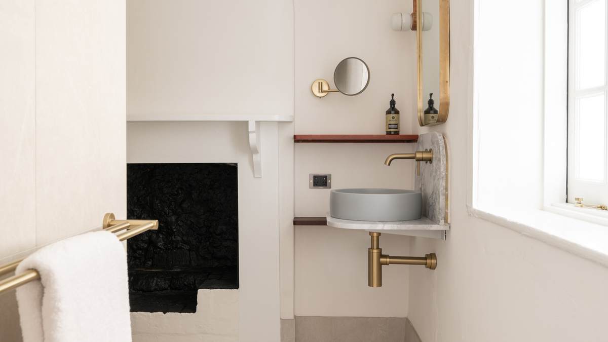 Nood Co Hoop Concrete Basin in Sky Grey, installed in a finished bathroom